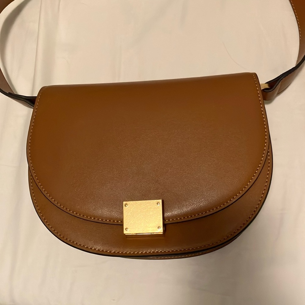 Tan saddle bag worn once